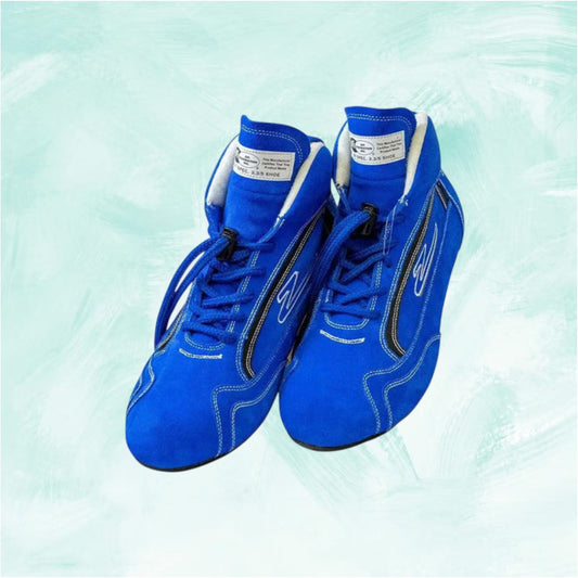 Pair of blue boxing shoes on a light blue background