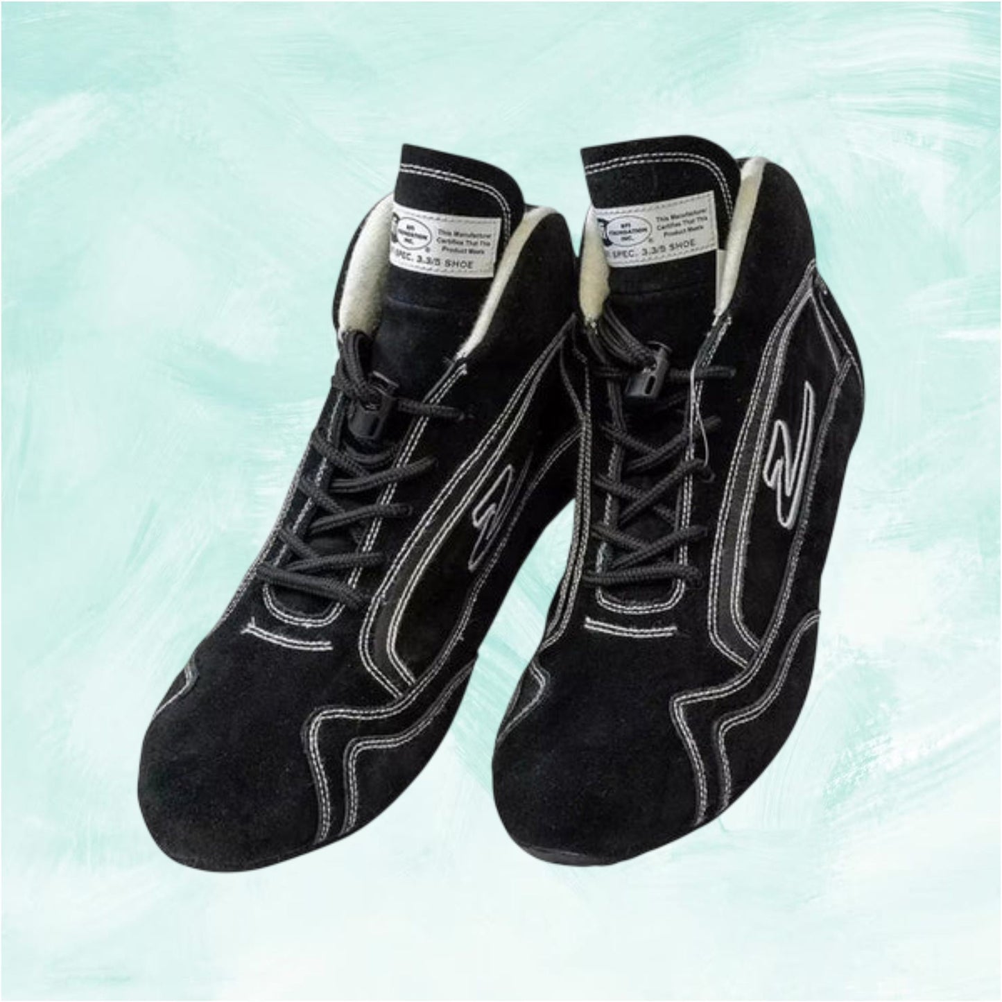 Black high-top sneakers with white accents on a light blue background